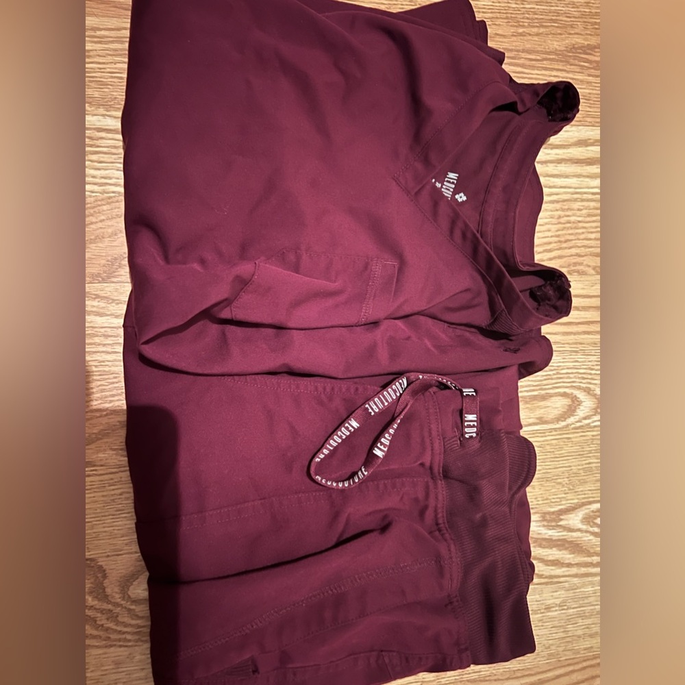 Burgundy med couture scrubs- gently worn, from a smoke free home.